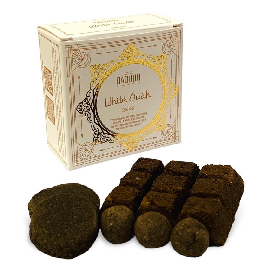 Daoudh White Oudh Bakhoor — cream and gold box with bakhoor chips